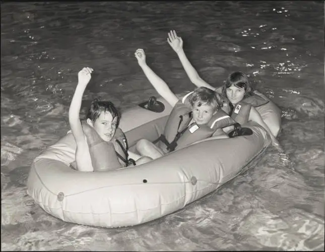 Children in dinghy, Manurewa, 1978