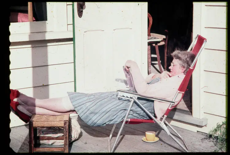 Alethea Rowntree relaxing at 144 Gillies Avenue, 1958
