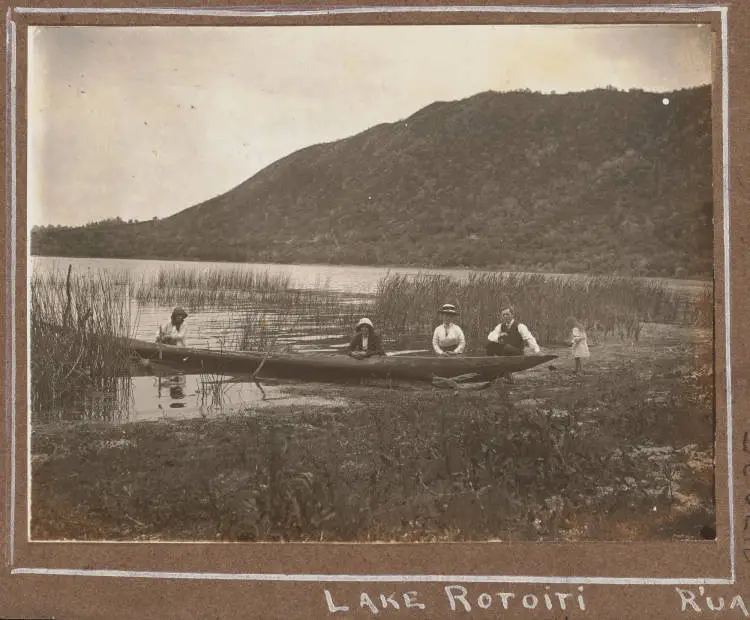 People in a waka on Lake Rotoiti, 1914