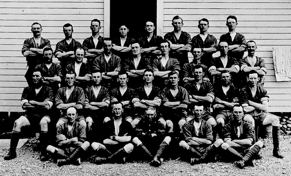 Soldiers outside a hut at Featherston Military Training Camp