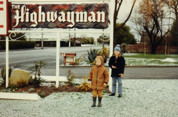 Children in snow at the Highwayman Motel, Masterton