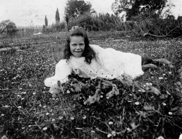 Young girl in a paddock