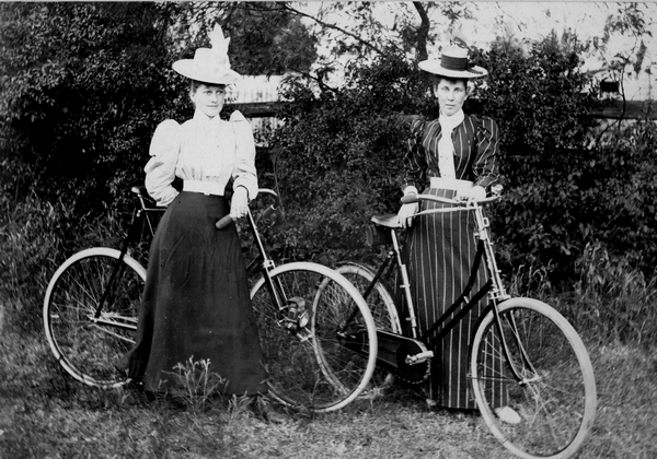 Two ladies with bicycles