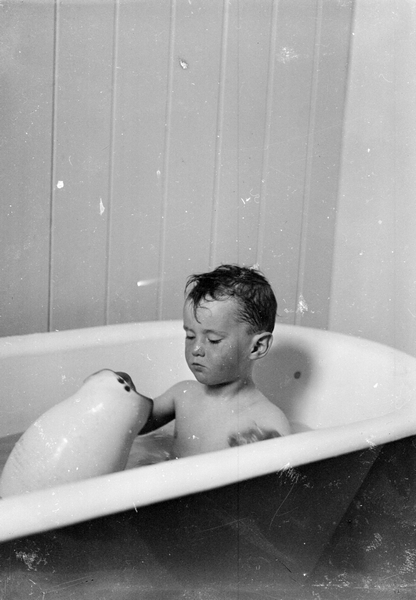 Small boy in a bath : digital image