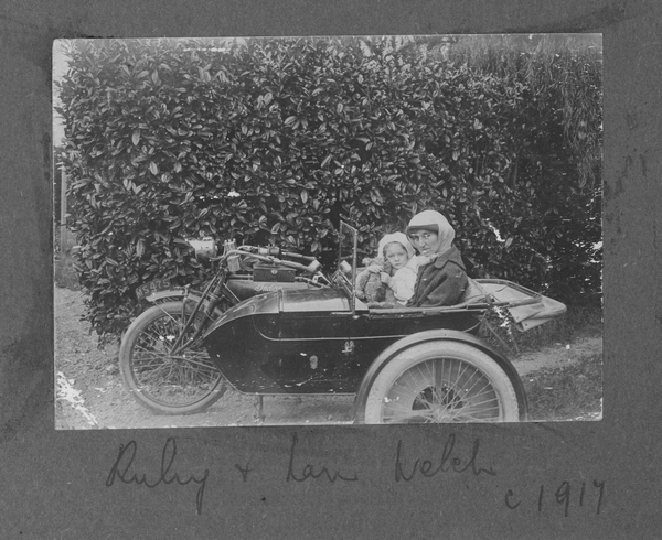 Ruby and Nan Welch sit in a sidecar : digital image