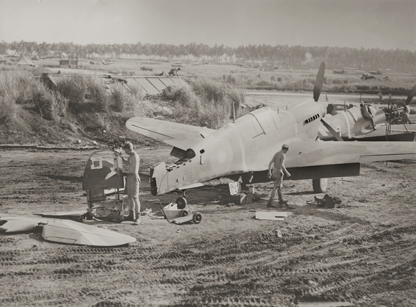 P-40 under repair on Guadalcanal : digital image