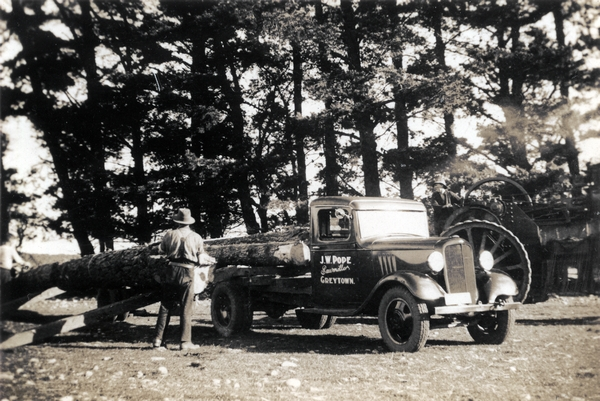 J.W. Pope truck carrying logs : Digital image