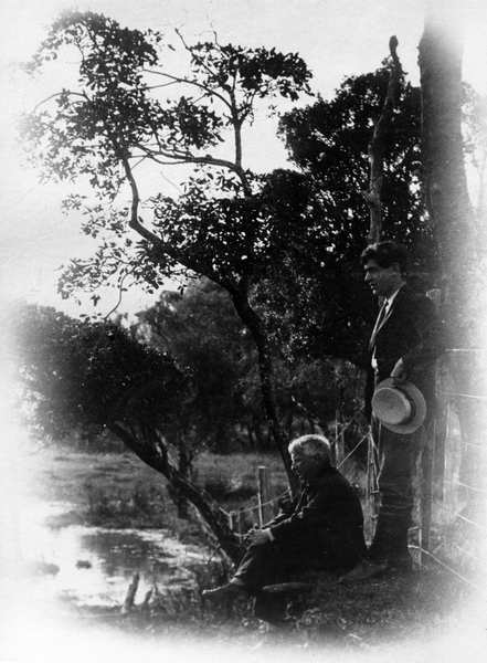 Charles Haigh and an older man on a river bank