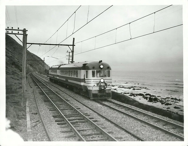 North Island New Zealand Blue Streak Rail Car travelling north between Pukerua Bay and Paekakariki main trunk line to Auckland