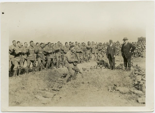 Pioneer Maori Battalion soldiers performing a Haka for Massey