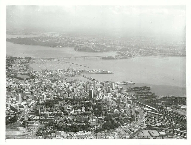 Auckland from above Parnell across Albert Park and downtown towards the Harbour Bridge, with North Shore beyond