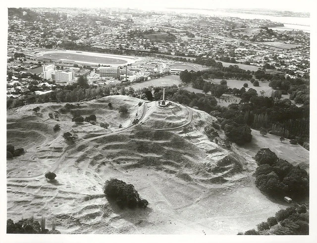Auckland: One Tree Hill, Maori Memorial & Cornwall Park. Greenlane Hospital & National Womens Hospital on the left. Alexandra Trotting Park & Epsom Show Grounds in background.