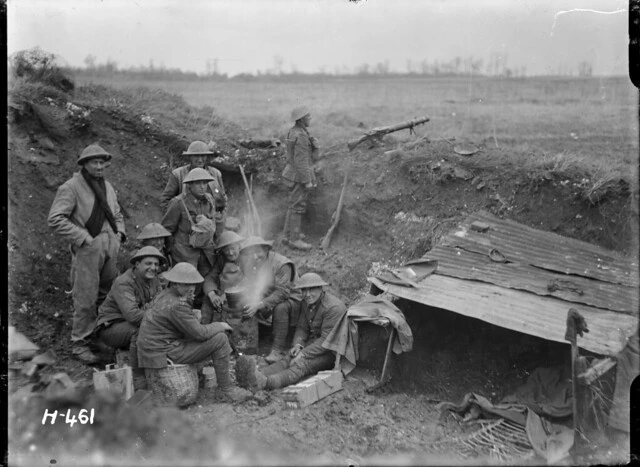 New Zealand soldiers around a billy in a strong post, near Mailly-Maillet, France, during World War I