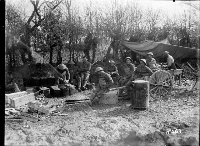 Maori Pioneers await their evening meal on the Somme