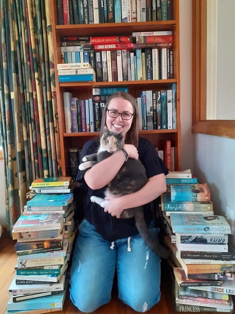 Librarian shelfies, Danielle from Ōrauwhata: Bishopdale Library and Community Centre (with Zeedee)