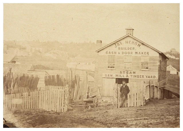 James Heron, Builder outside the Sash & Door Maker, Steam Saw Mill & Timber Yard, Auckland, New Zealand, ca. 1865