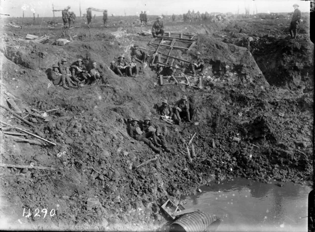 World War I New Zealand Engineers resting in a large shell hole at Spree Farm