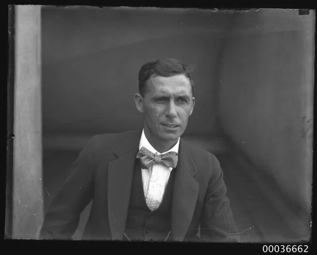 Image of a man, possibly vet W. Neilson, standing near Phar Lap's accomodation SS MONOWAI
