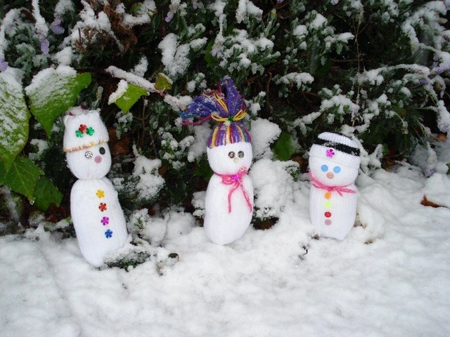 Snow people frolicking in the snow