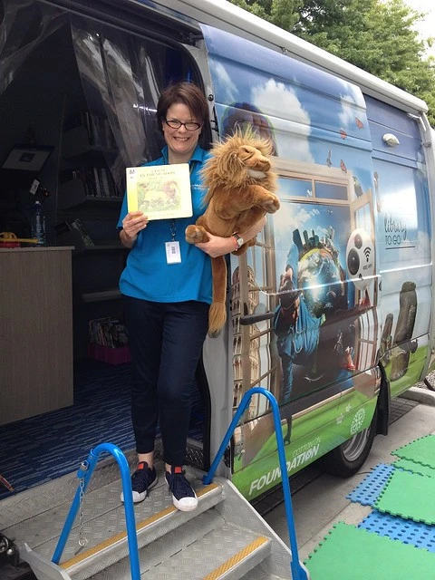 Katie and the library van at Margaret Mahy Family Playground