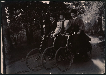 [Nurse Bessie, Nurse Pierce and unidentified nurse riding bicycles]