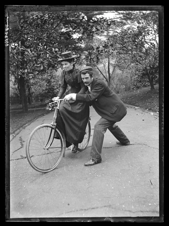 [Nurse Bessie McKay, on bicycle, with Mr Hodson, Auckland Private Hospital]