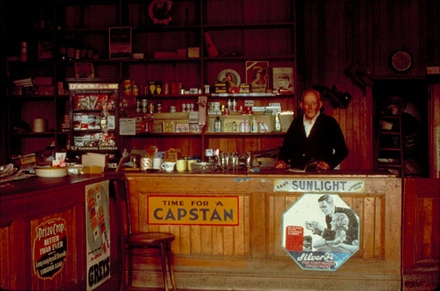 Ted Duggan's Store, Matakanui. I'd taken Ted's photo the year before for a magazine. In this picture, taken from the same angle, he is looking for it.