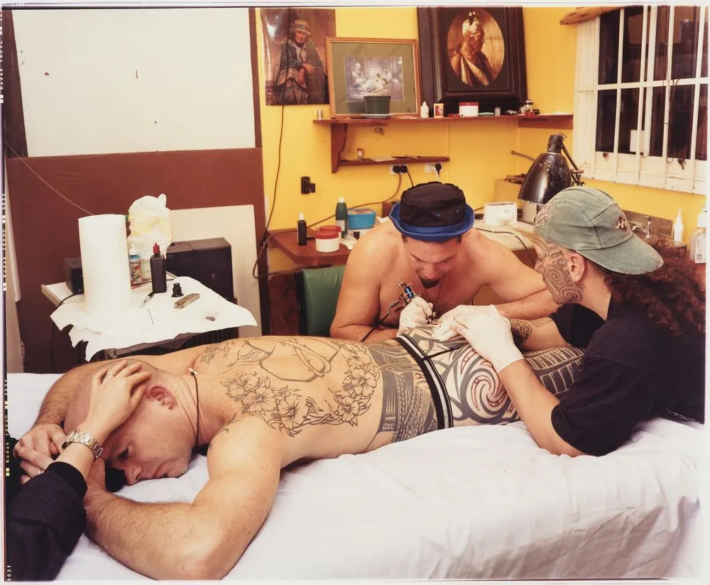 2000. The Tuhoe Embassy, Taneatua, Bay of Plenty. Tattooing Andrew Lister. Tufuga tatatau: Su'a Sulu'ape Paulo II. Tohunga tā moko: Tim Worrall. Tattooist: Otis Frizzell