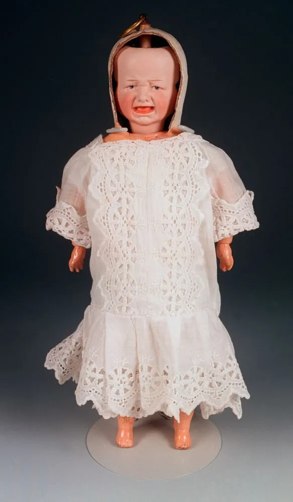 Three faced doll