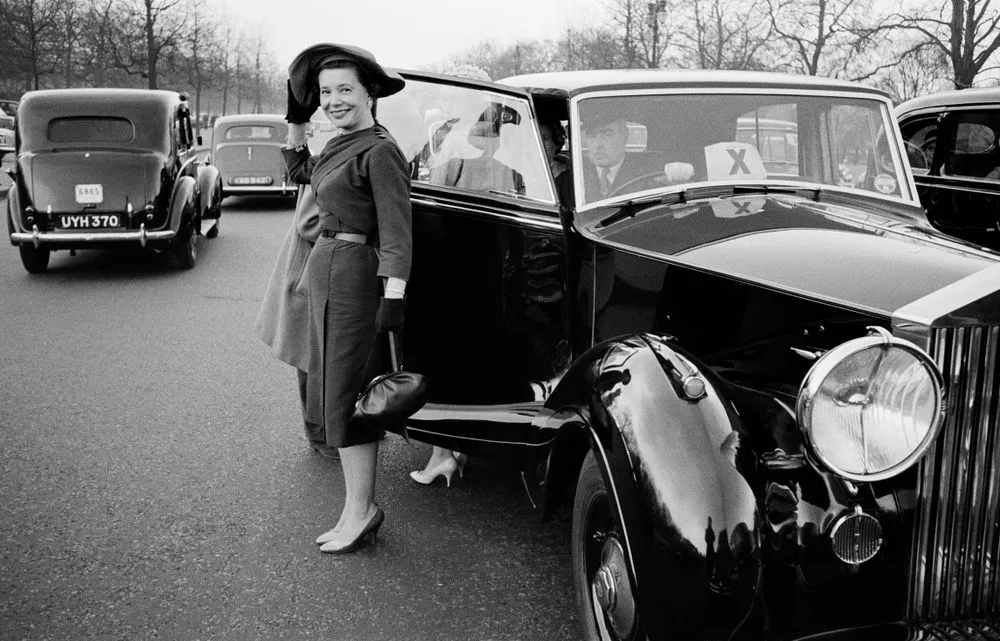 The last presentation of debutantes to a British monarch, Buckingham Palace, London