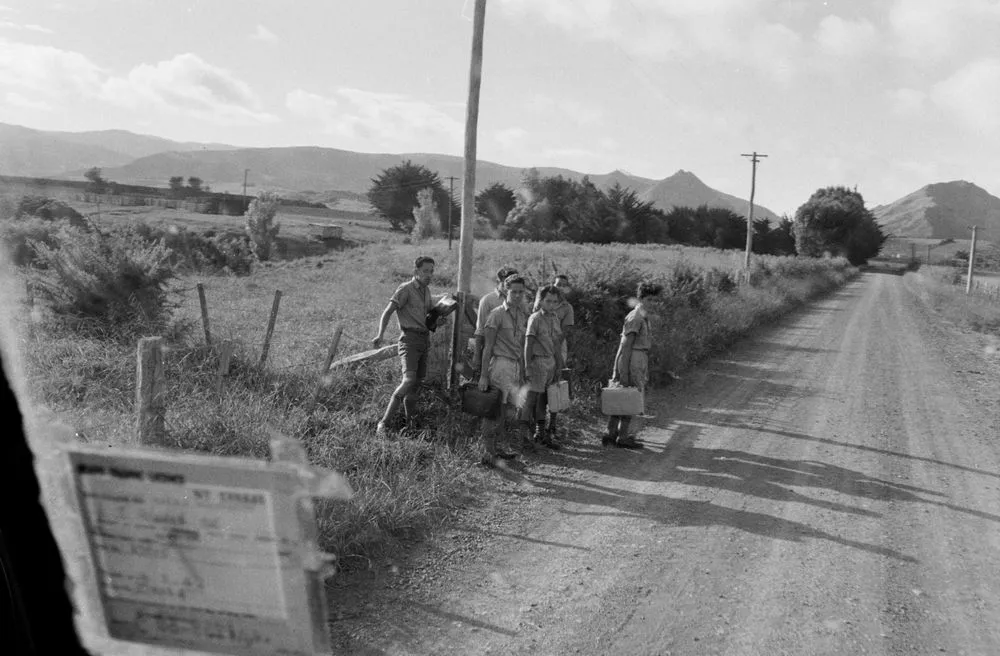 School boys waiting for bus