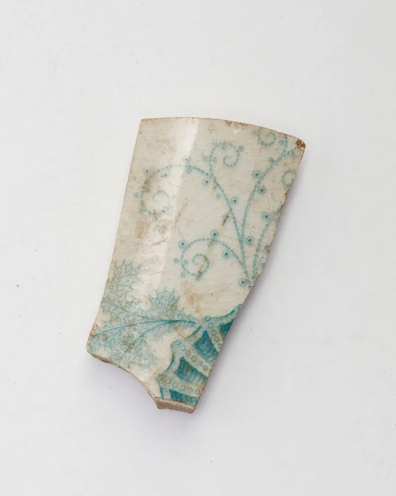 Fragment of china with blue/green design