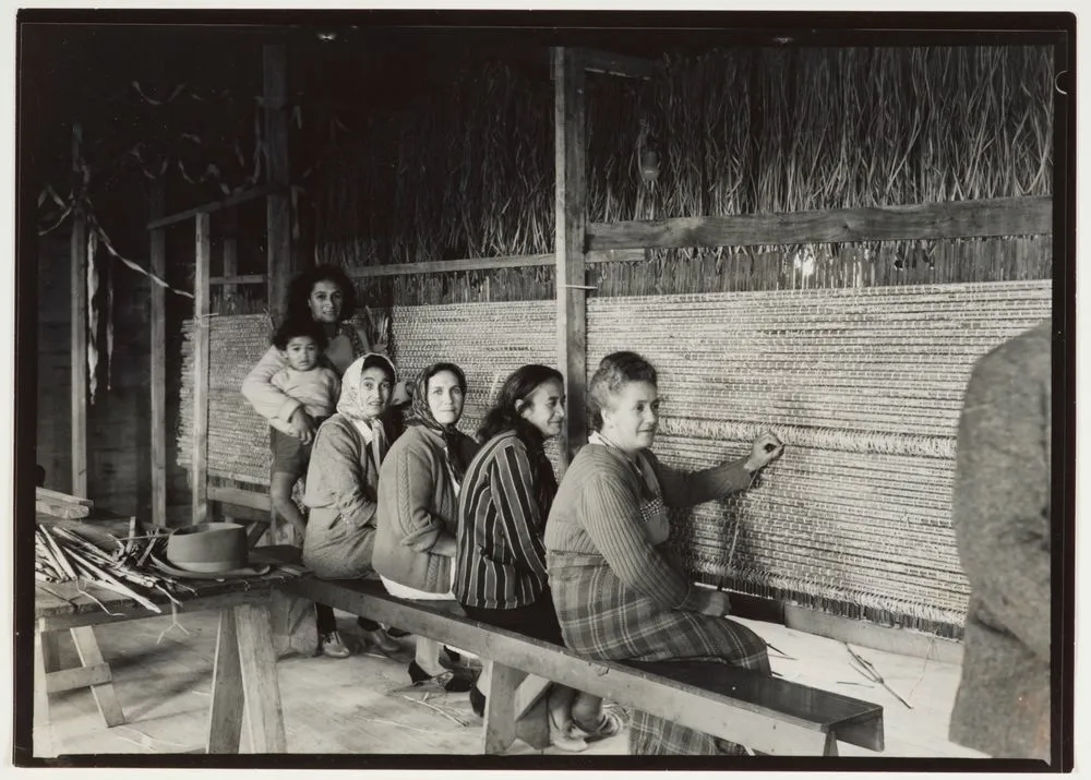 Maori women weave tukutuku (woven wall panel) for Rangiatea church, Otaki.