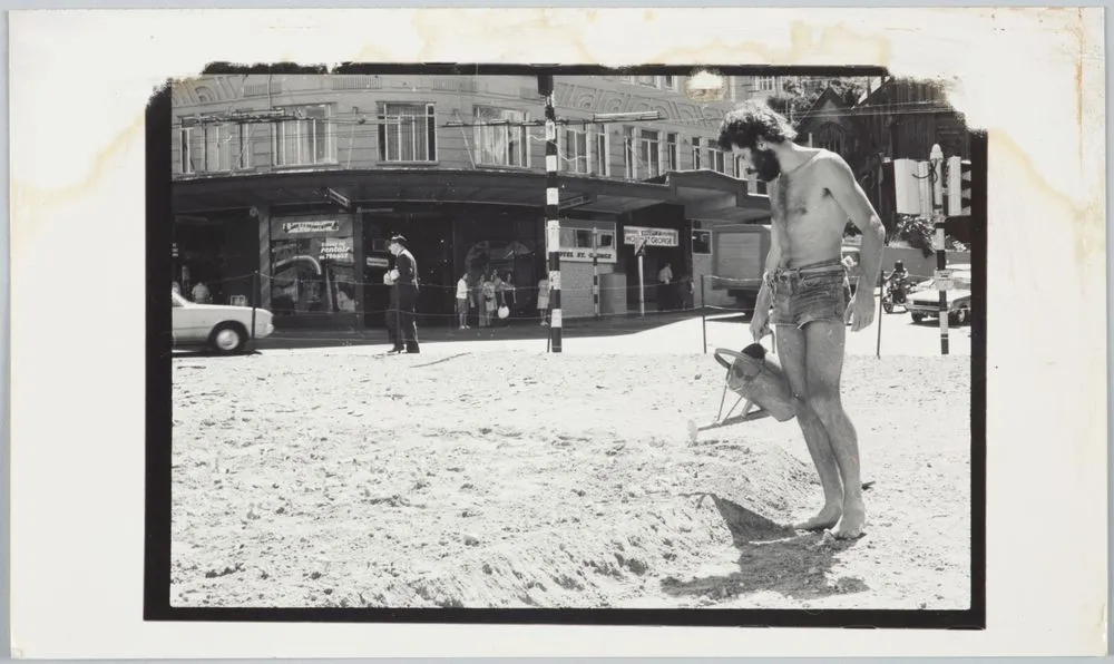 Hugh Walton watering the cabbage patch