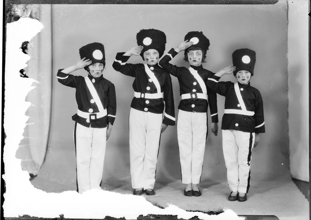 Children's dance tableau in toy soldier costume