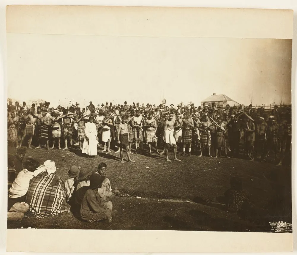 Large group of Maori men with guns