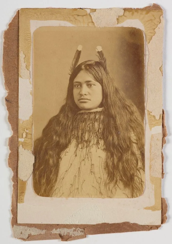 Young Maori woman with very long hair.