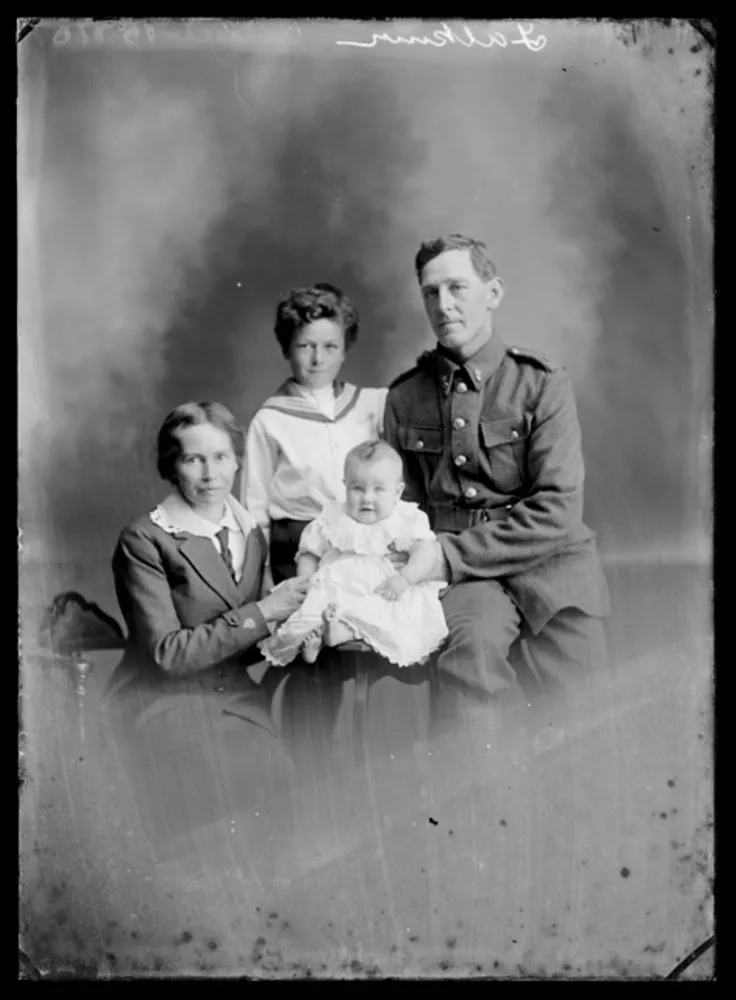 Charles Henry Faulkner and his wife Edith Faulkner, with their children Edwin and baby Eslet