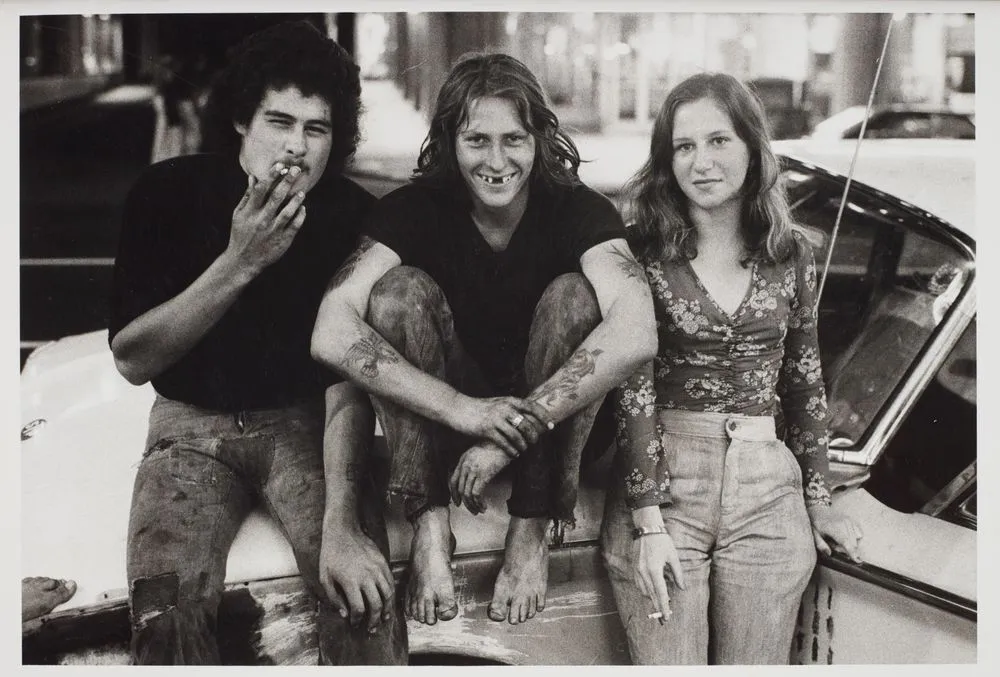 Mike Walker, Steve Bliss and Sandra Lindsay, Queen St, Auckland. From the series: Flash cars