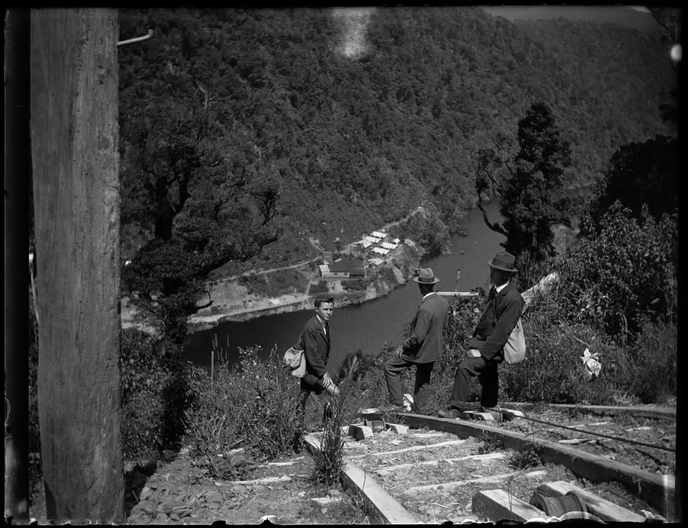 Lower end of Tokomaru-Arapete Reservoir showing dam, from spur leading down to men's cookhouse
