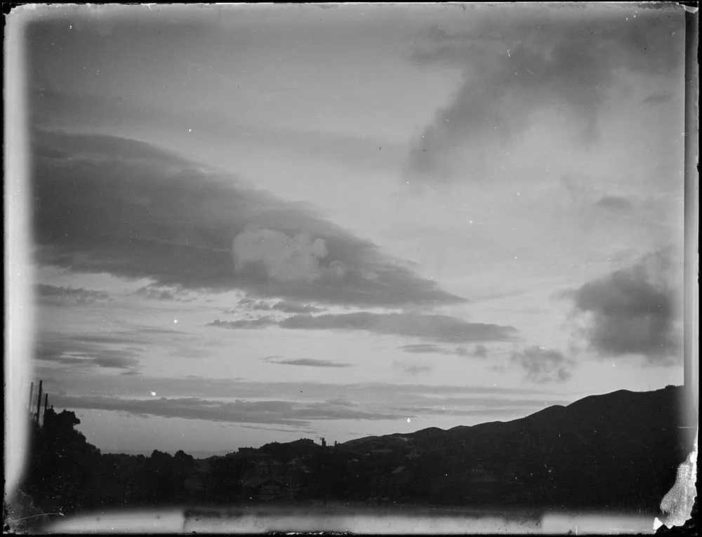 Brooding clouds above hill