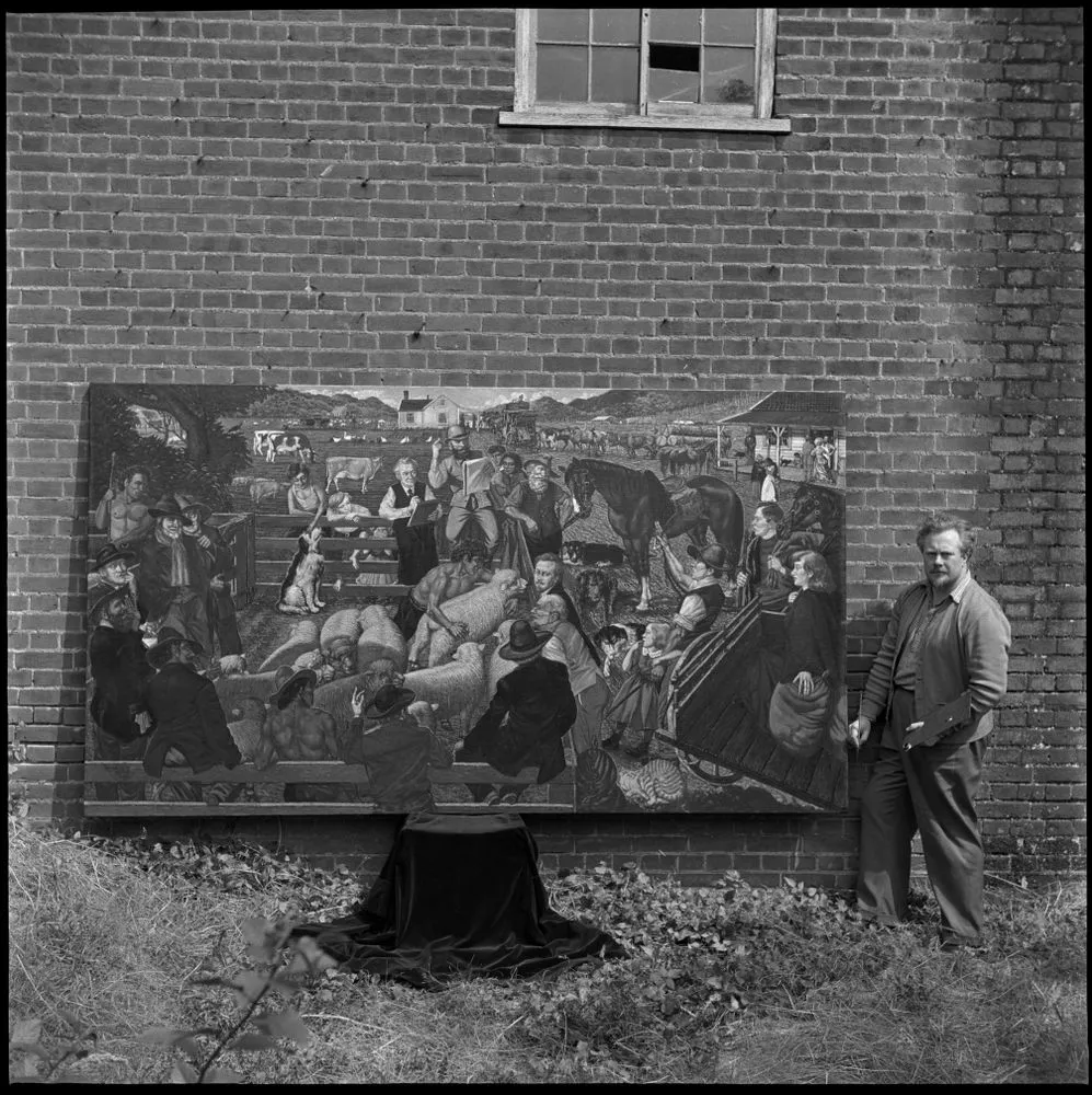 Untitled [Leonard Victor Mitchell standing next to mural]