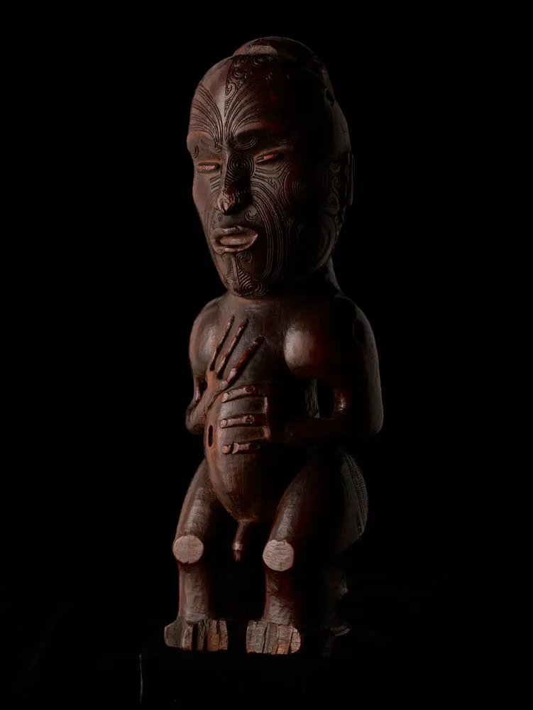 Pou whakairo (freestanding carved figure)