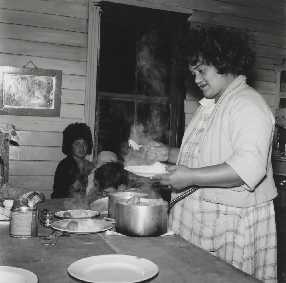 Everyone gets a large helping from the pot of sausages... From the series: Washday at the pa