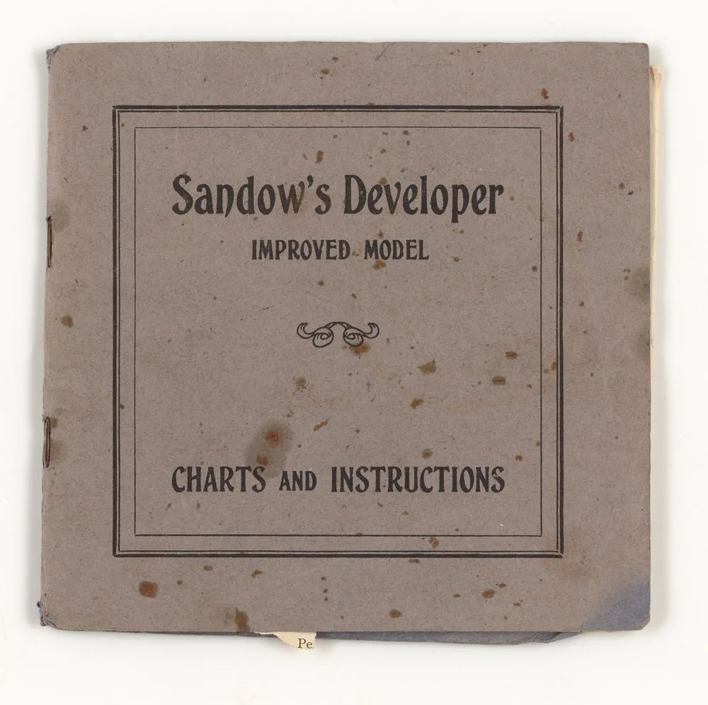 Sandow chest expander accessory - booklet with fold-out charts