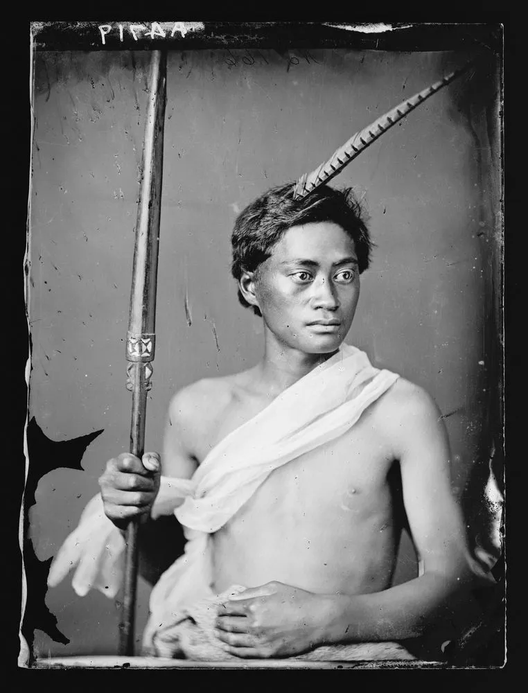 Maori man, feather in hair, sash