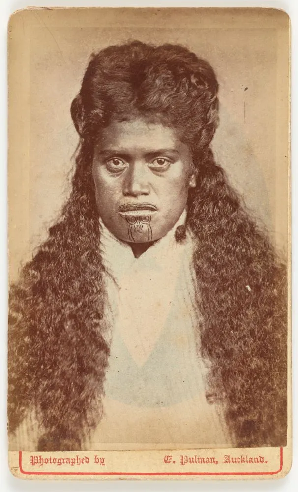 Woman with long hair and moko kauae