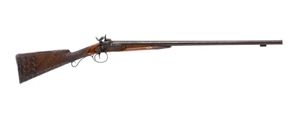 Tupara (double-barrelled shotgun).