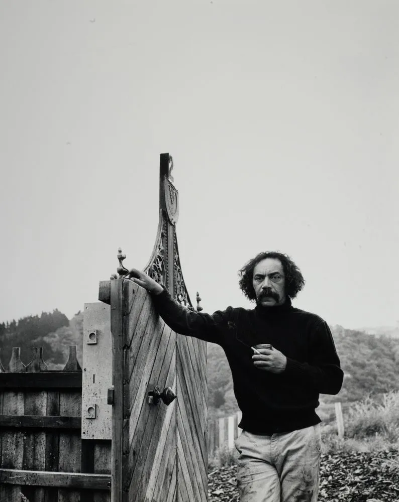 Ralph Hotere outside "first studio" on Flagstaff, Port Chalmers