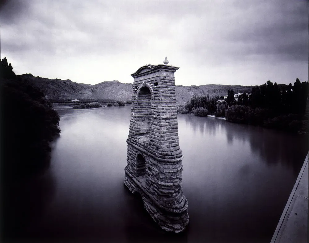 Old bridge structure from new bridge: Clutha River: Alexandra 1980